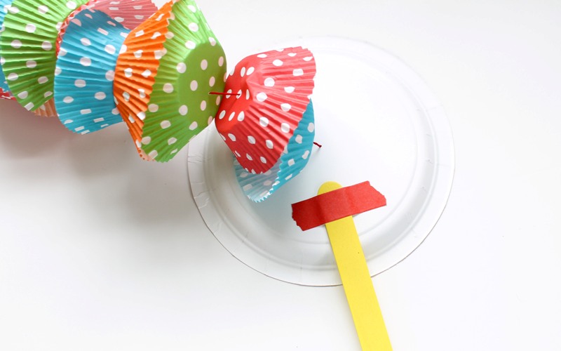 cupcake liner taped to paper plate