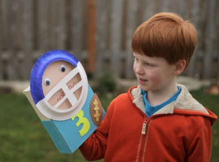 Recycled cereal box football player puppet craft