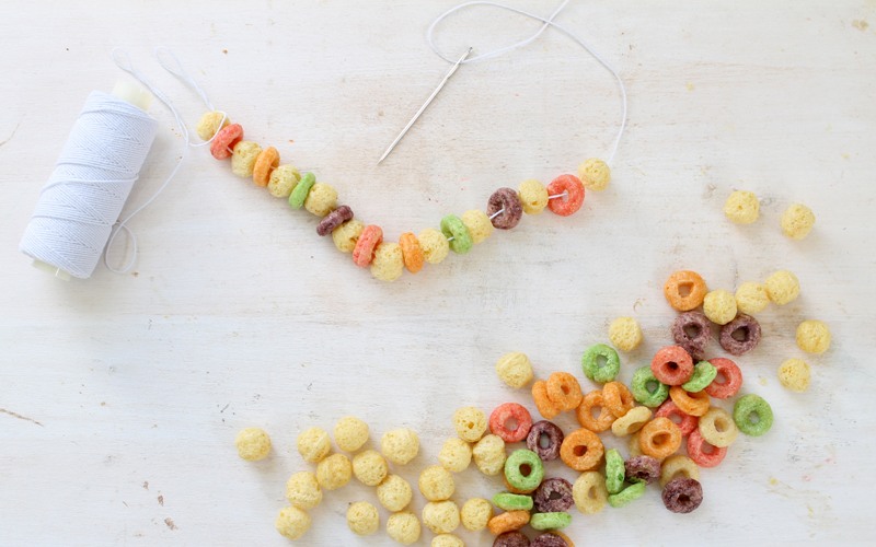 making patterns using colorful cereal bits
