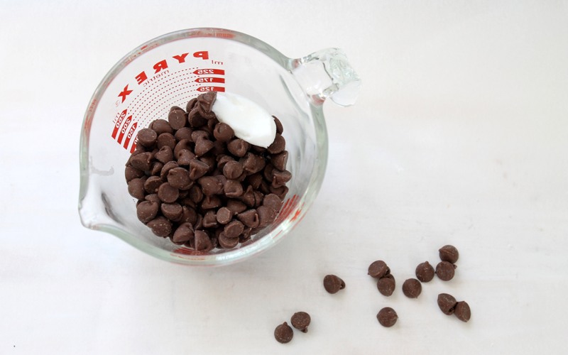 melt chocolate chips in microwave safe measuring cup for kix pot o gold treats