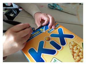 Create a boredom buster box out of a cereal box