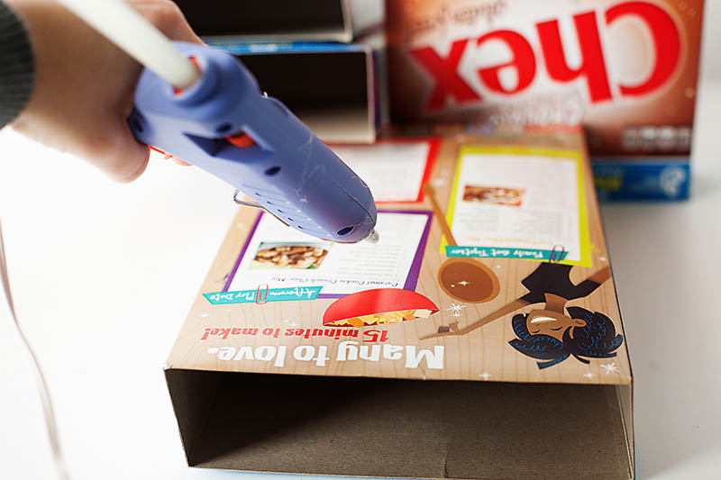 use hot glue gun to glue cereal boxes together