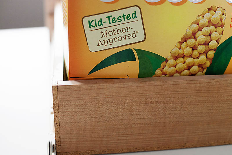 measure height of the cereal box by placing in drawer