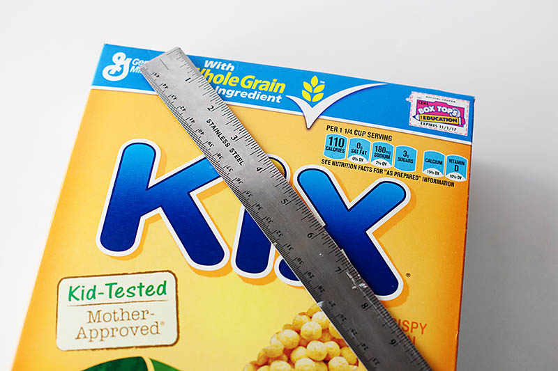 cut diagonal line to cut kix cereal box