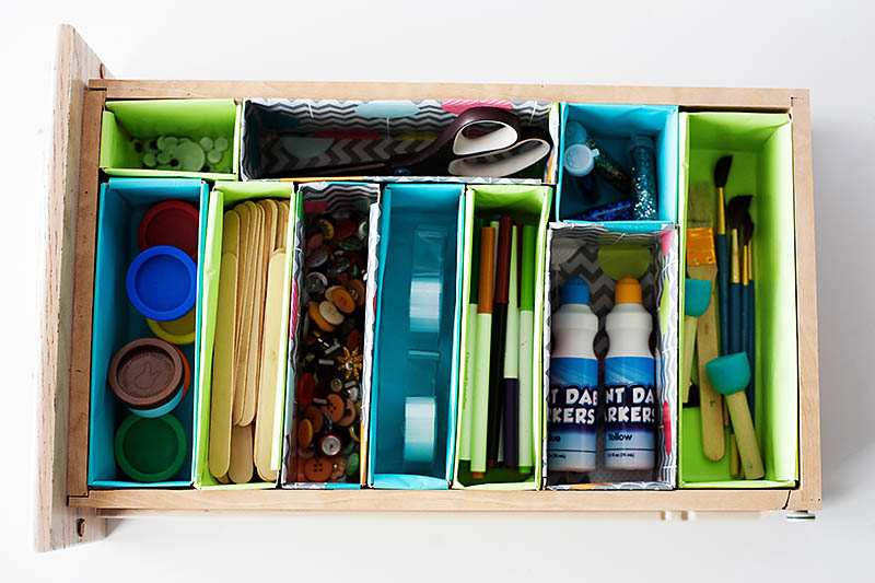help to organize junk drawer with cereal box organizers