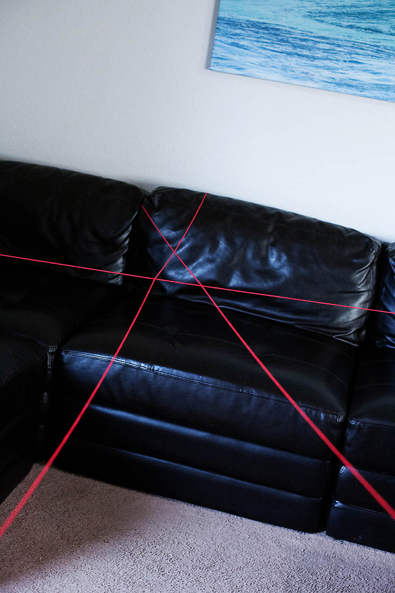 tie yarn to a point and then string at many different points throughout the room