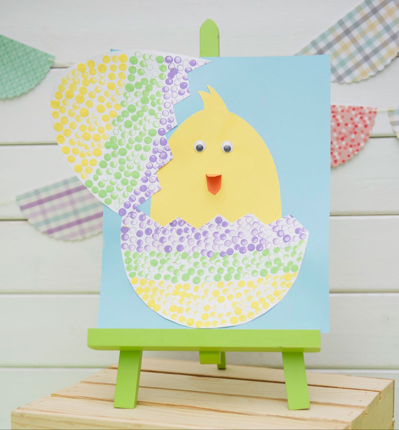 Paper Easter egg and hatching baby chick