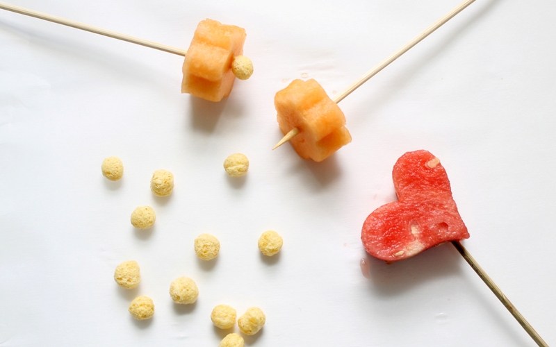 Top the bamboo skewer with fruit and Kix cereal piece.