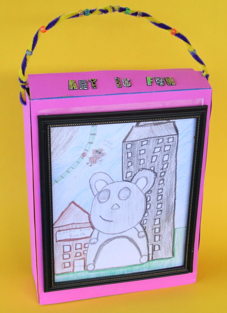 Art is fun craft kit - made of a cereal box - fill with art supplies. Portable gallery frame!