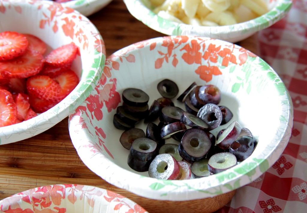 Watermelon pizza: make grapes into "olives"