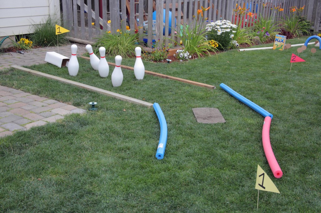 DIY Mini Golf Course in the backyard - it has a sand trap!